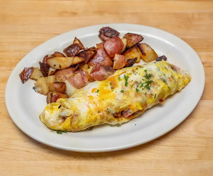 Omelette served with seasoned home fries